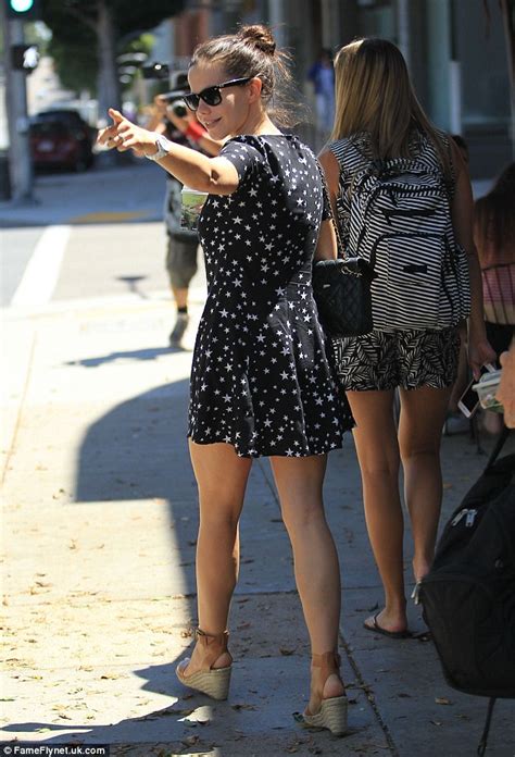 Tammin Sursok pouts for a snap with a friend while out and about in Los Angeles | Daily Mail Online