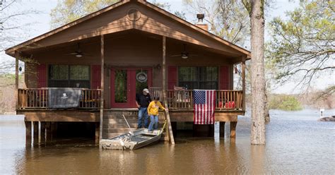 High winds hit Northwest, flooding in South