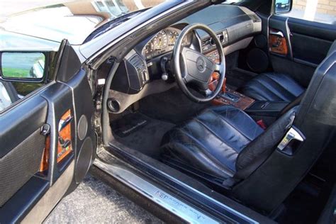 1992 Mercedes SL500 roadster,very clean,both tops,black/black,no rust.