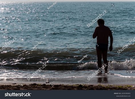 Silhouette People Walking On Beach Unrecognisable Stock Photo 2235783931 | Shutterstock