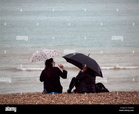 A rainy day on the beach at Brighton Stock Photo - Alamy