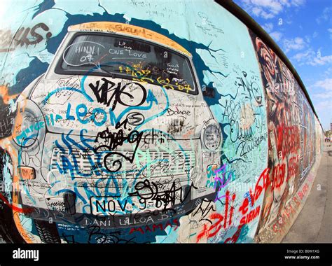 Iconic graffiti on Berlin Wall at East Side Gallery Stock Photo - Alamy