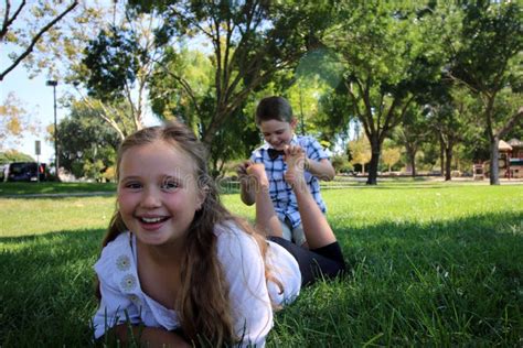 Children With Their Feet In The Air/ Being Tickled Stock Photo - Image: 57795864