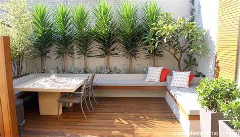 Create an Outdoor Room with Wooden Flooring and Plants