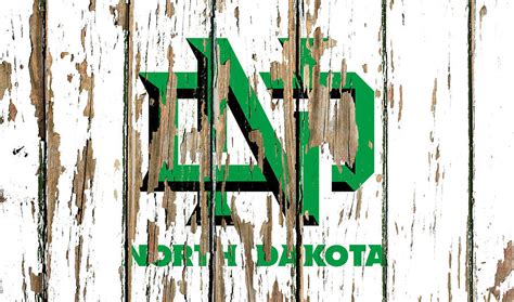 North Dakota University Vintage College Logo Peeling Paint Barn Wood Mixed Media by Design ...