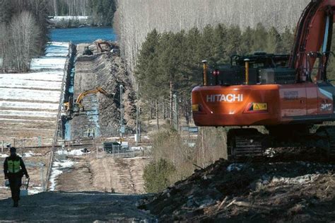 Finland unveils first section of Russian border fence | The Straits Times