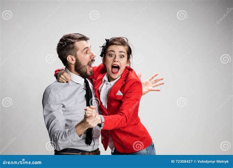 The Business Man and Woman Laughing on a Gray Background Stock Image ...