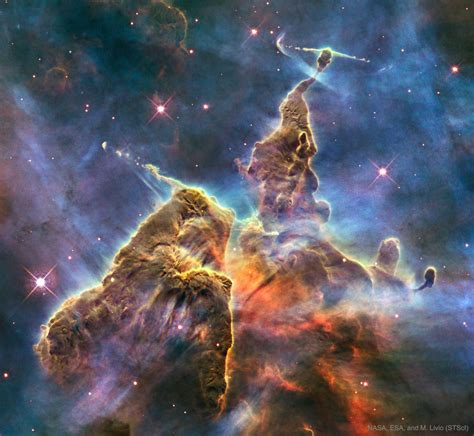 APOD: 2017 July 2 - Mountains of Dust in the Carina Nebula