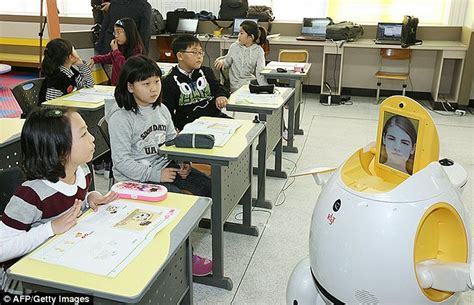 Robot teachers with human faces roll into the classroom to run English lessons | Daily Mail Online