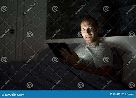 Man Working at Night, Lying on the Bed Stock Image - Image of house, casual: 100399973