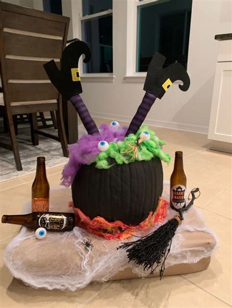 a halloween decoration made out of beer bottles