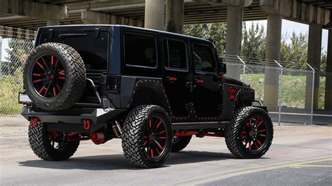 Show King - Black JK with Red Accents on Large Wheels — CARiD.com Gallery