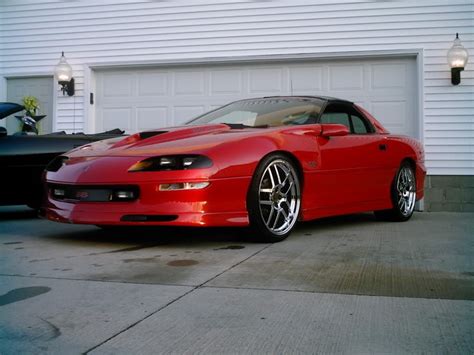 The World's Best 4th Gen Camaros: 97 Red Camaro SS LT1 on 20s