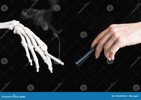 E-Cigarette vs cigarette stock photo. Image of ideas - 216640058