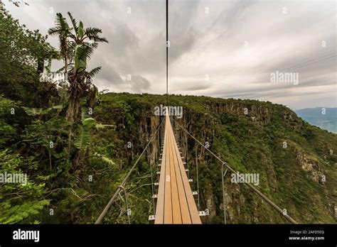 Nyanga Mountains, Zimbabwe. People walking on the "Skywalk" - a bridge over Mutarazi Falls, the ...