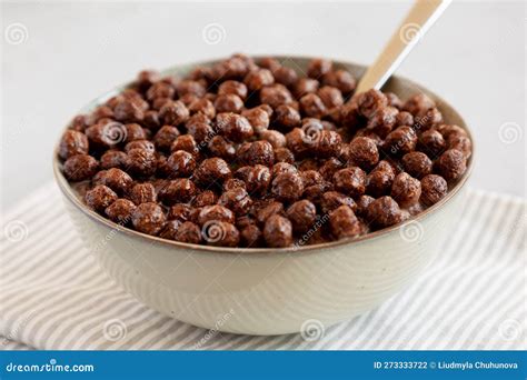 Chocolate Puff Cereal with Milk in a Bowl, Side View Stock Photo ...