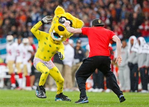 The Jaguars mascot is apprehended after making a 'streak' during the ...