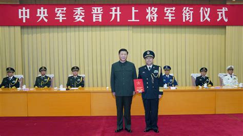 Xi presents order to promote military officer to rank of general - CGTN