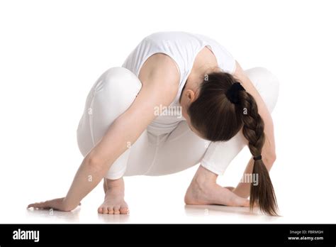 Woman squat pose Cut Out Stock Images & Pictures - Alamy