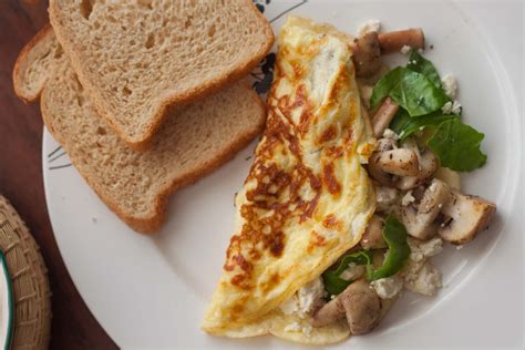 Mushroom & Goat Cheese Omelette with Spinach Recipe by Archana's Kitchen