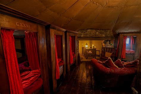 Curl up with a cosy fire at this Gryffindor-themed dormitory in the UK - Lonely Planet