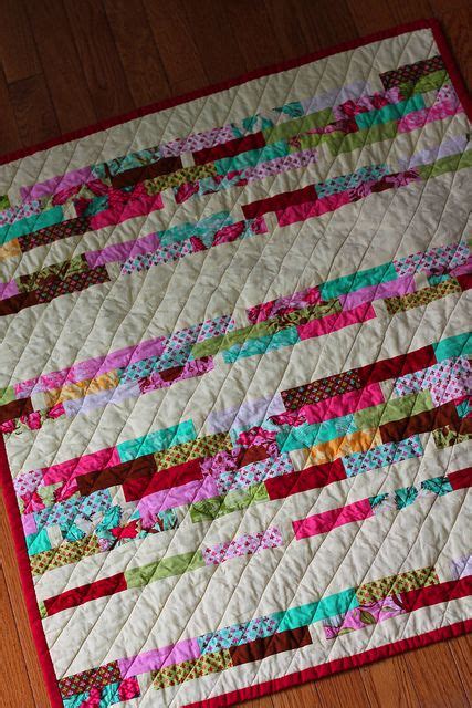 Strip Quilt with diagonal quilting... Not sure about the diagonal quilting, but I like the ...