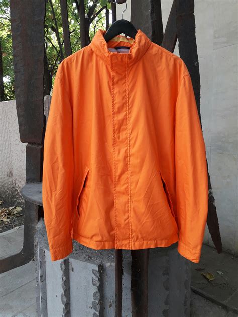 Paul & Shark Orange raincoat Paul & Shark | Grailed