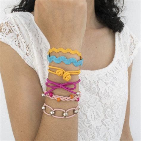 Learn how to make these five styles of elastic bracelets that double as ...