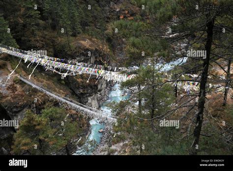 The Larja suspension Bridge over the Dudh Koshi river, near Namche Bazar village, Everest base ...