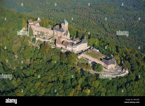 PINK SANDSTONE MEDIEVAL CASTLE ON A MOUNTAIN TOP (aerial view). Haut ...