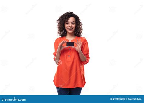 Young Curly Brunette Woman Dressed in Orange Blouse Holding Plastic ...