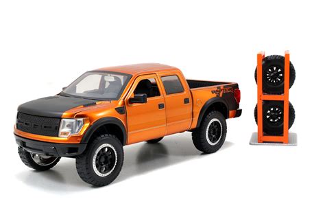 Just Trucks 1:24 2011 Ford F-150 SVT Raptor Die-cast Car with Tire Rack Orange Play Vehicles ...