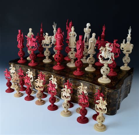 A VERY FINE AND RARE EARLY 19TH CENTURY CHINESE IVORY NAPOLEON CHESS SET