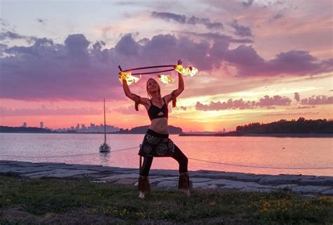 Hawaiian-Themed Fire Performance on George's Island - Cirque De Light