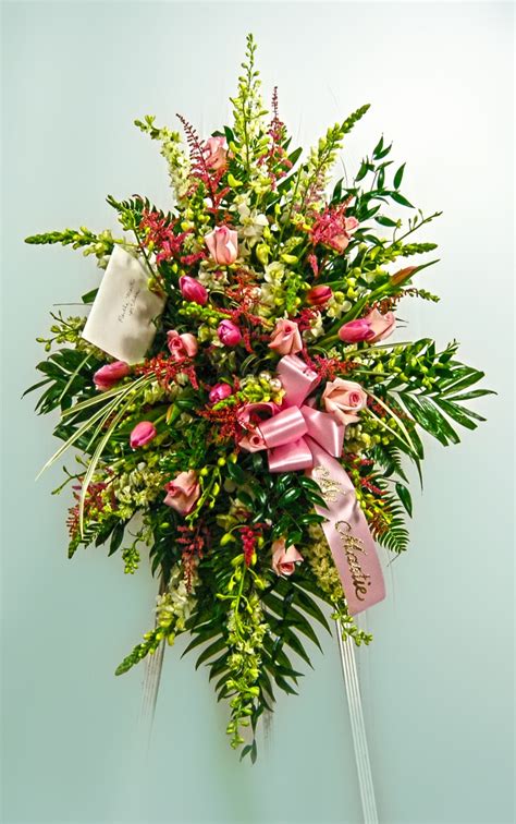 Standing Easel spray make with snapdragons, roses, tulips, and lilies ...