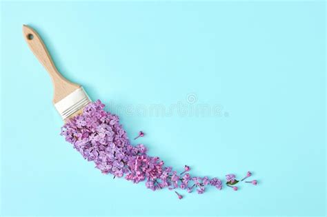 Creative Composition with Flower and Paint Brush on Pastel Blue Background. Minimal Nature ...