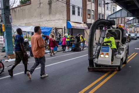 City workers clear two encampments on Kensington Avenue