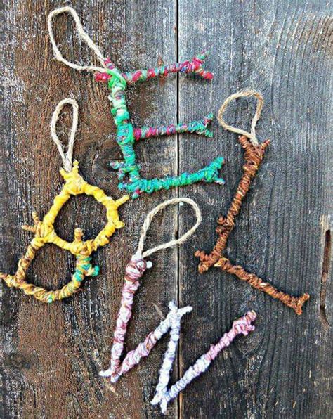 Stick and wool letters | Twig crafts, Nature crafts, Craft stick crafts