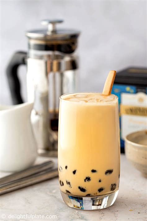 This Brown Sugar Milk Tea (Boba) is a creamy iced tea sweetened with dark brown sugar, giving it ...