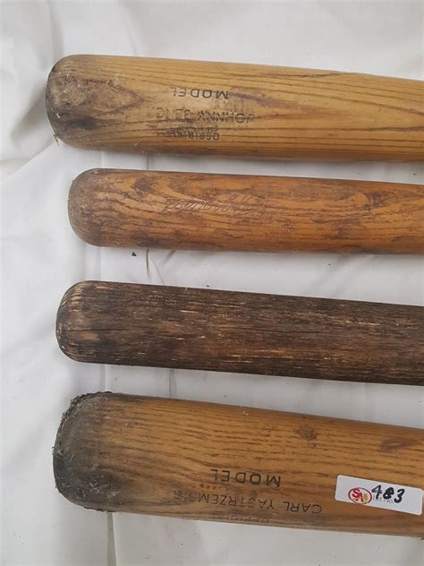 4 WOODEN BATS LOT #1