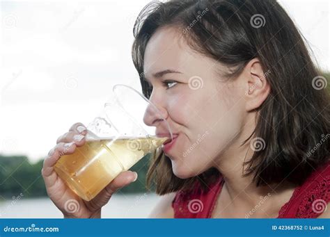 Pretty woman drinking beer stock photo. Image of drinking - 42368752