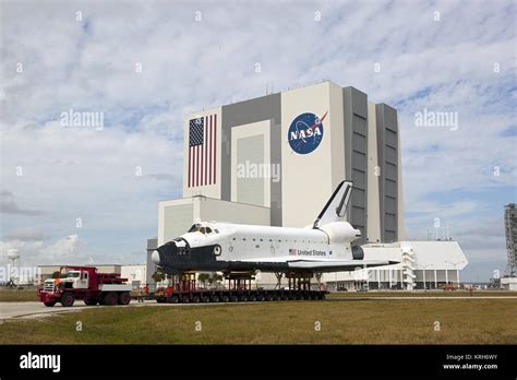 Space Shuttle Explorer moves past VAB at Kennedy Space Center Stock ...