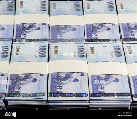 Stacks of New Taiwan Dollar bills Stock Photo - Alamy