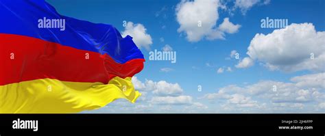 official flag of Galicia and Lodomeria 1849 1890 Austria at cloudy sky background on sunset ...