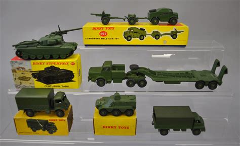Four boxed Dinky Toys military vehicles: 651 Centurion Tank; 697 25 ...