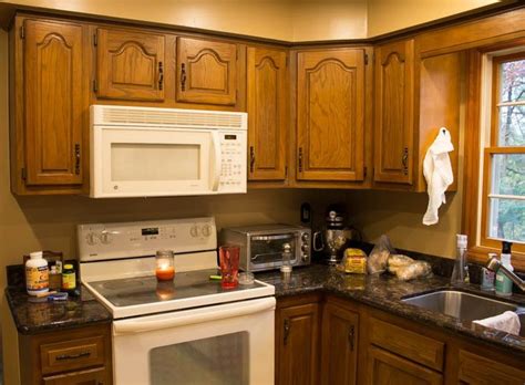 How to Paint Oak Cabinets WHITE | Painting oak cabinets, Kitchen cabinets, Clean kitchen cabinets