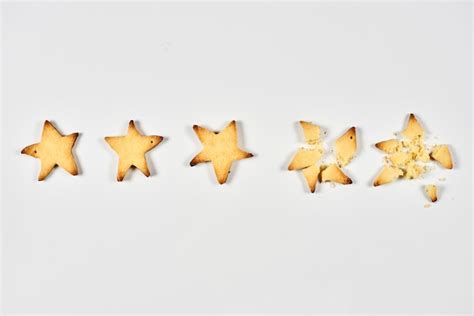 Premium Photo | Star shaped cookies on a white table