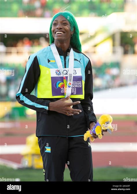 Shaunae Miller-Uibo (BAH) on the podium to receive her Gold medal in ...