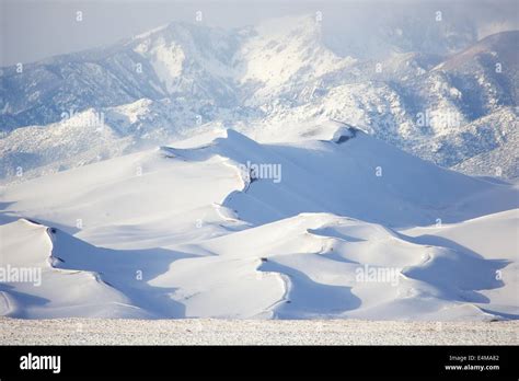 Great Sand Dunes National Park covered in snow in Winter Stock Photo - Alamy