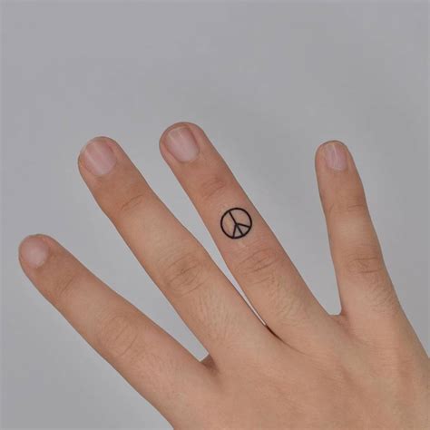 Discover more than 75 peace sign finger tattoo best - in.eteachers